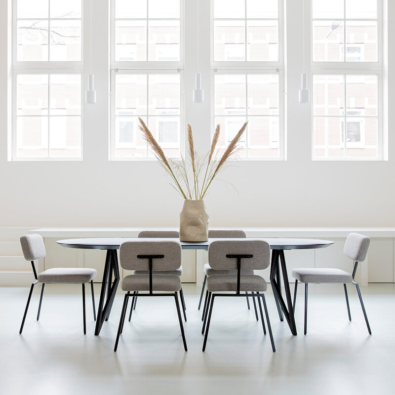 Flat oval Design dining table | Butterfly Steel black powdercoating | Oak black stain | Studio HENK| 