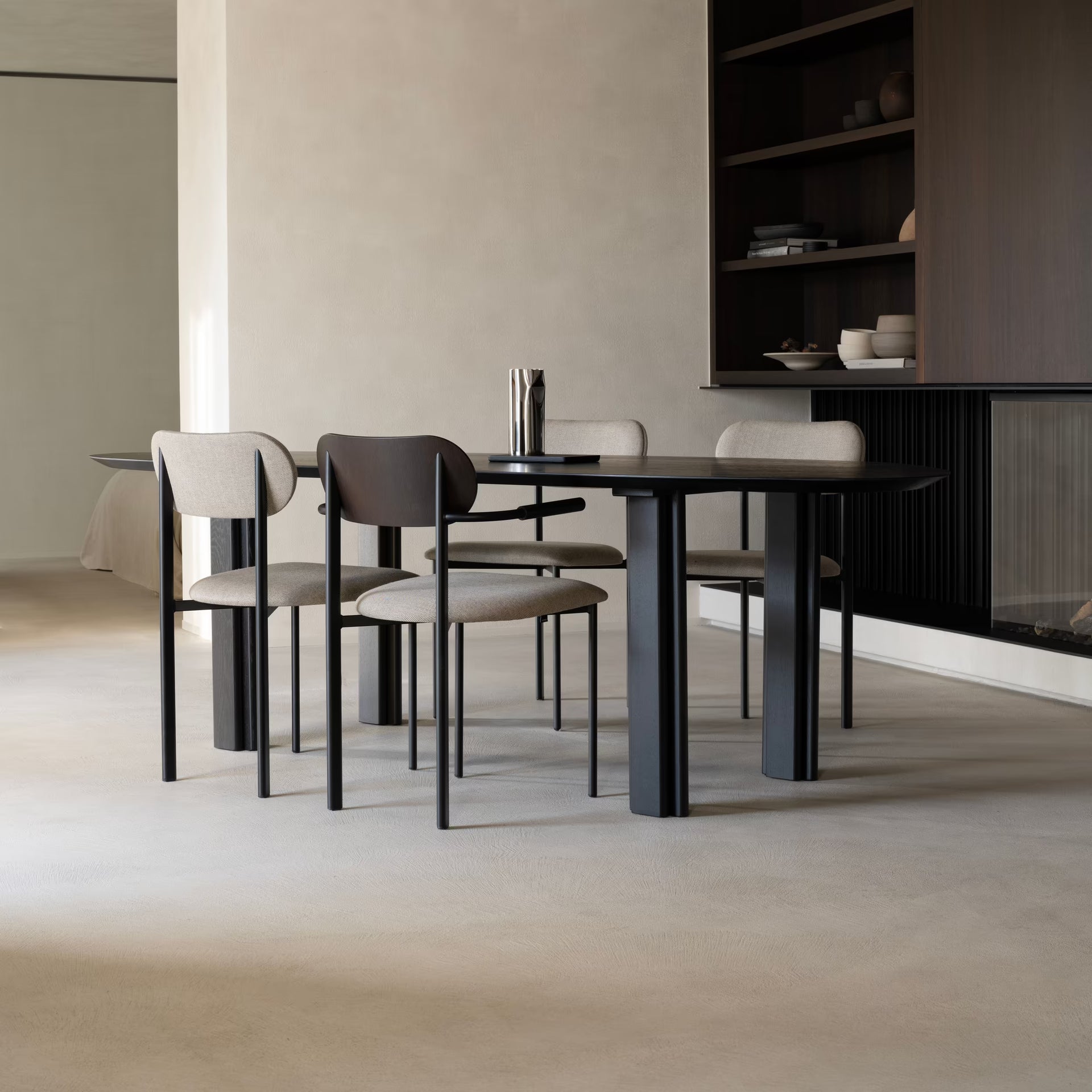 Oblique dining chair with armrest