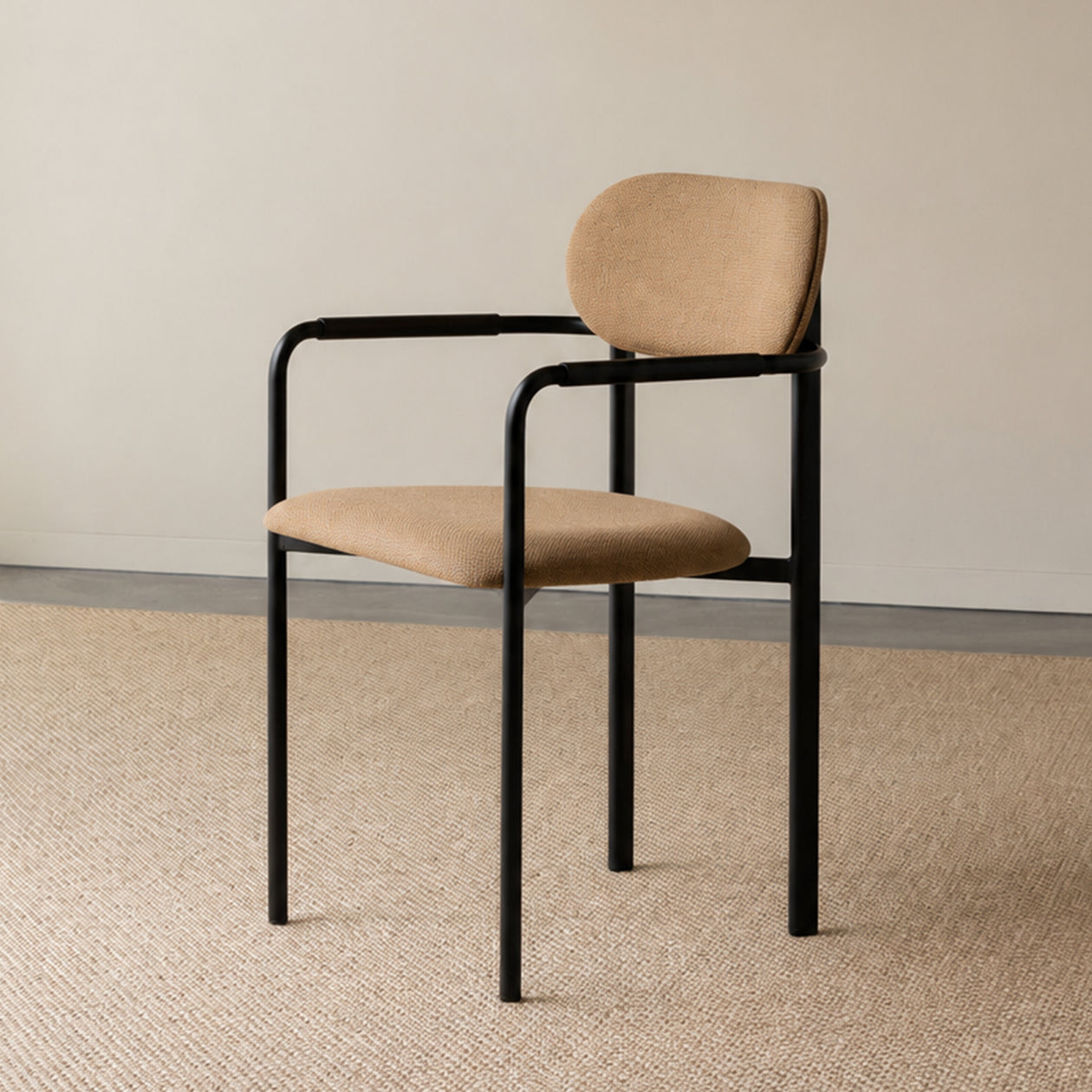 Oblique dining chair upholstered with armrest