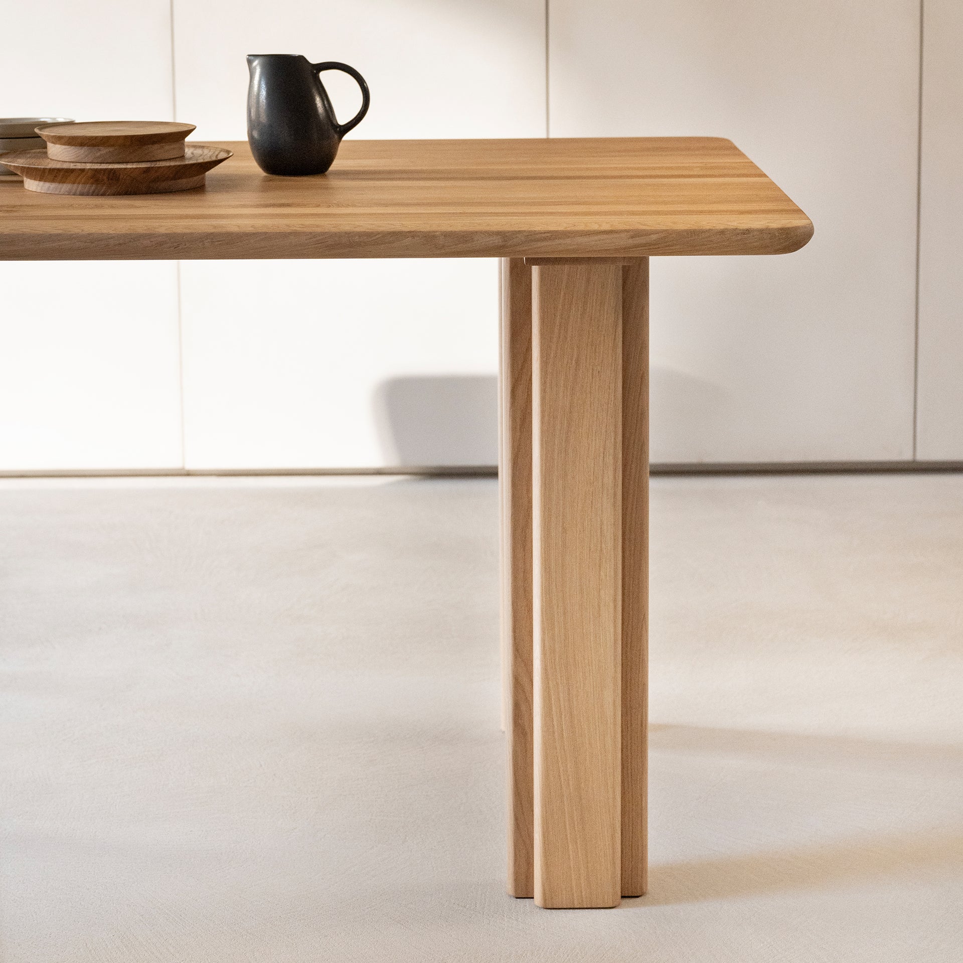 Solid dining bench, dark brown stained oak, 180cm radius