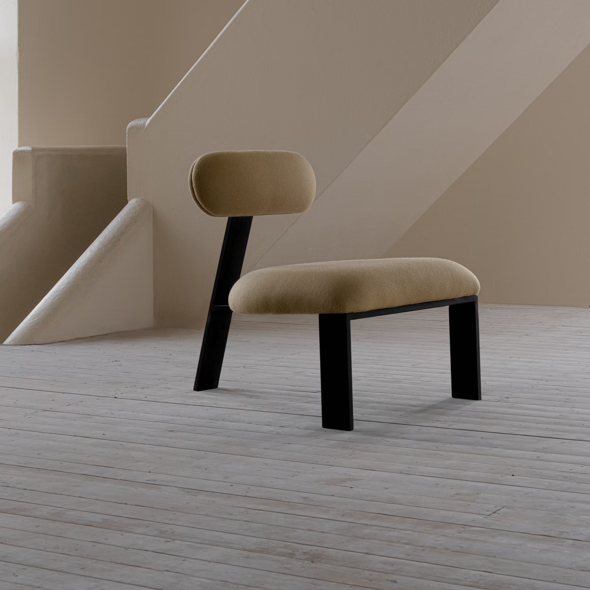 Oblique armchair