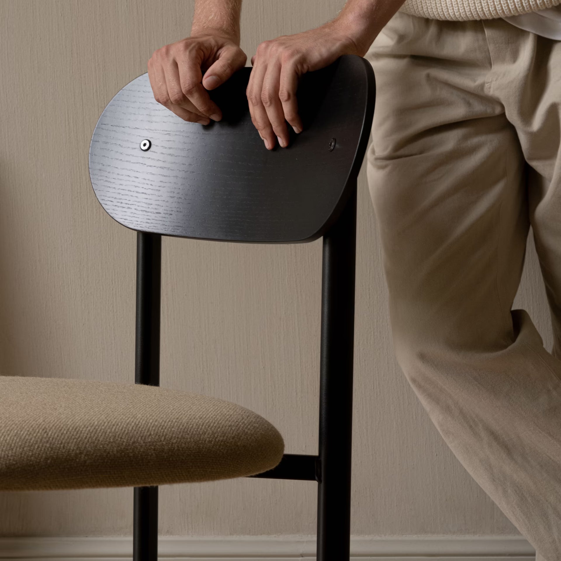 Oblique dining chair with armrest